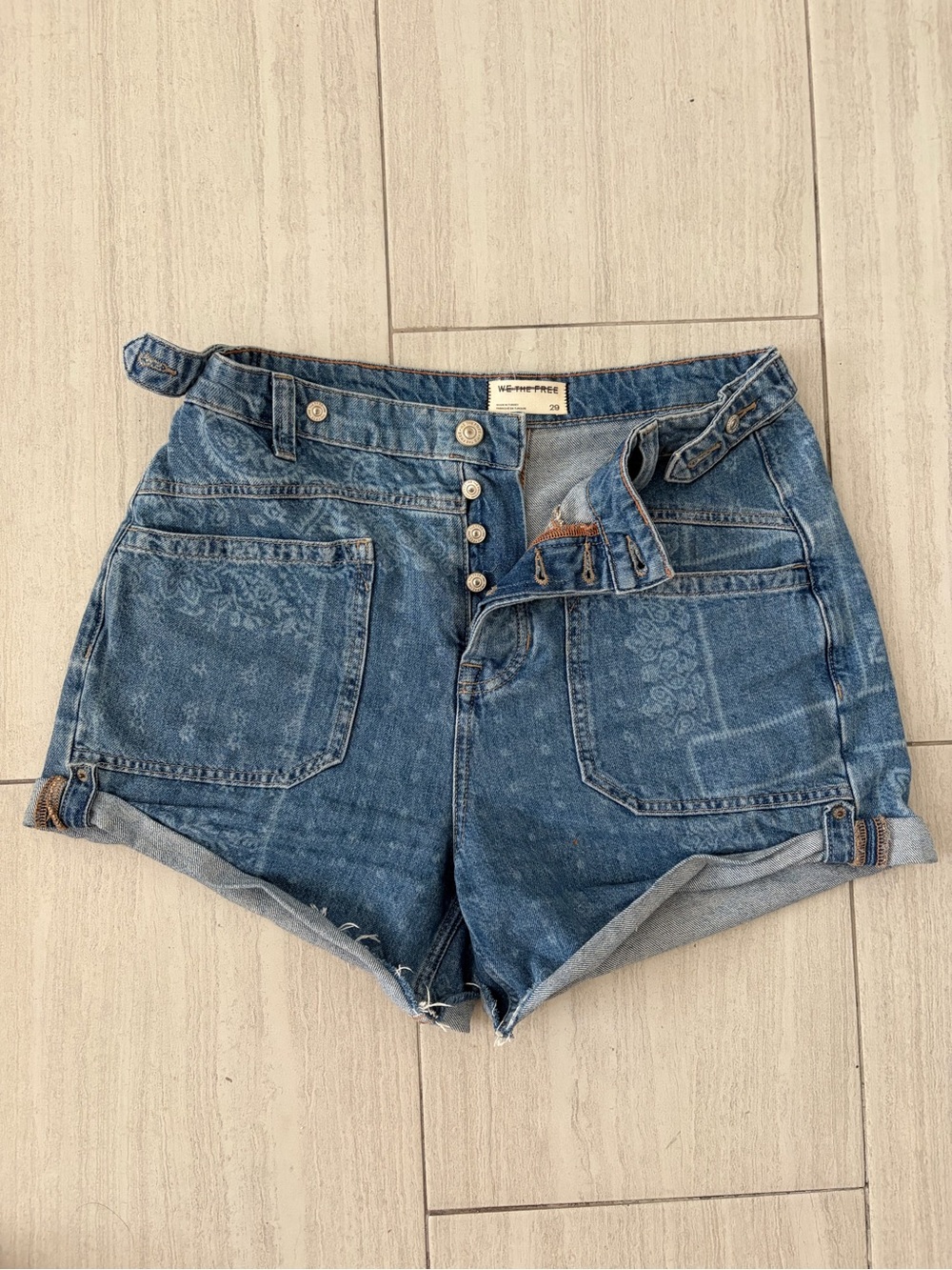 We The Free Distressed Blue Floral Denim Button-Front Shorts